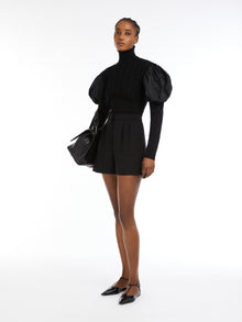 Wool jumper with taffeta sleeves