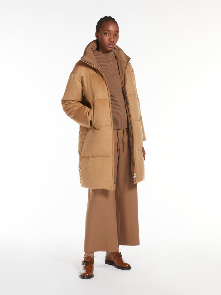 Long, reversible camel colour down jacket