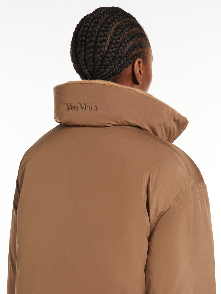 Long, reversible camel colour down jacket