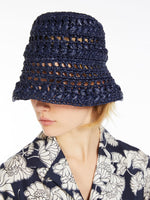 Crochet-knit raffia hat